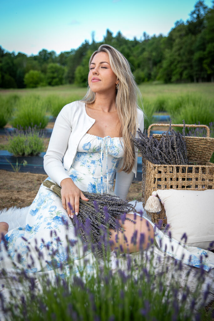 Woman in her 30s captured in a lavender field photo shoot.